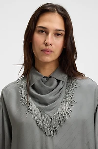 Oversize-fit blouse with logos and fringing