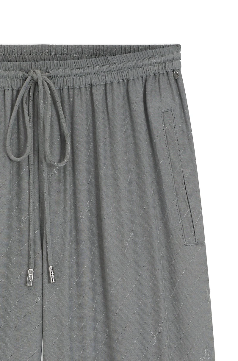 Wide-leg trousers with logo jacquard