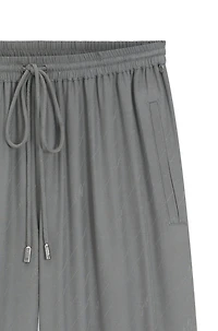 Wide-leg trousers with logo jacquard