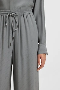 Wide-leg trousers with logo jacquard