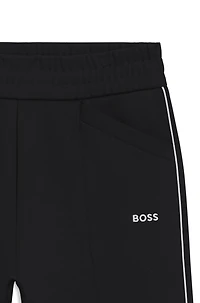 Straight-fit tracksuit bottoms with contrast logo and piping