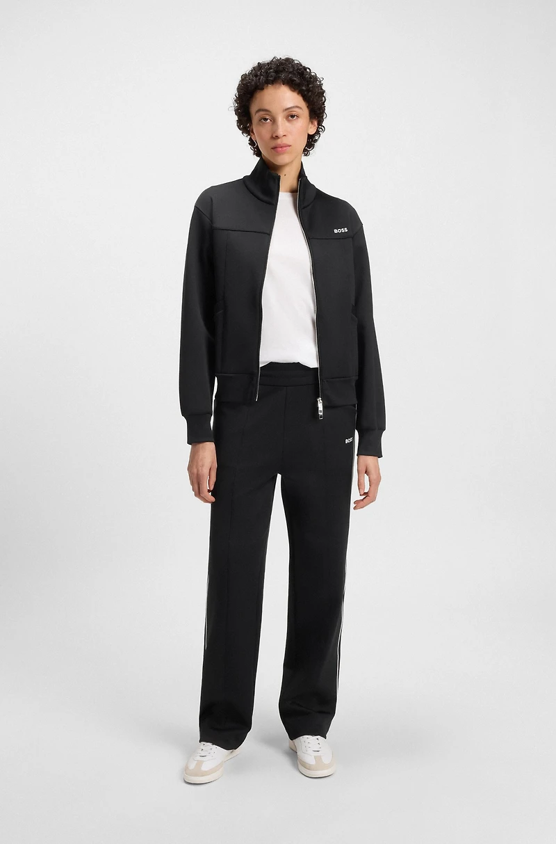 Straight-fit tracksuit bottoms with contrast logo and piping