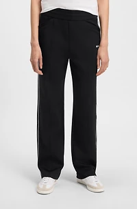 Straight-fit tracksuit bottoms with contrast logo and piping