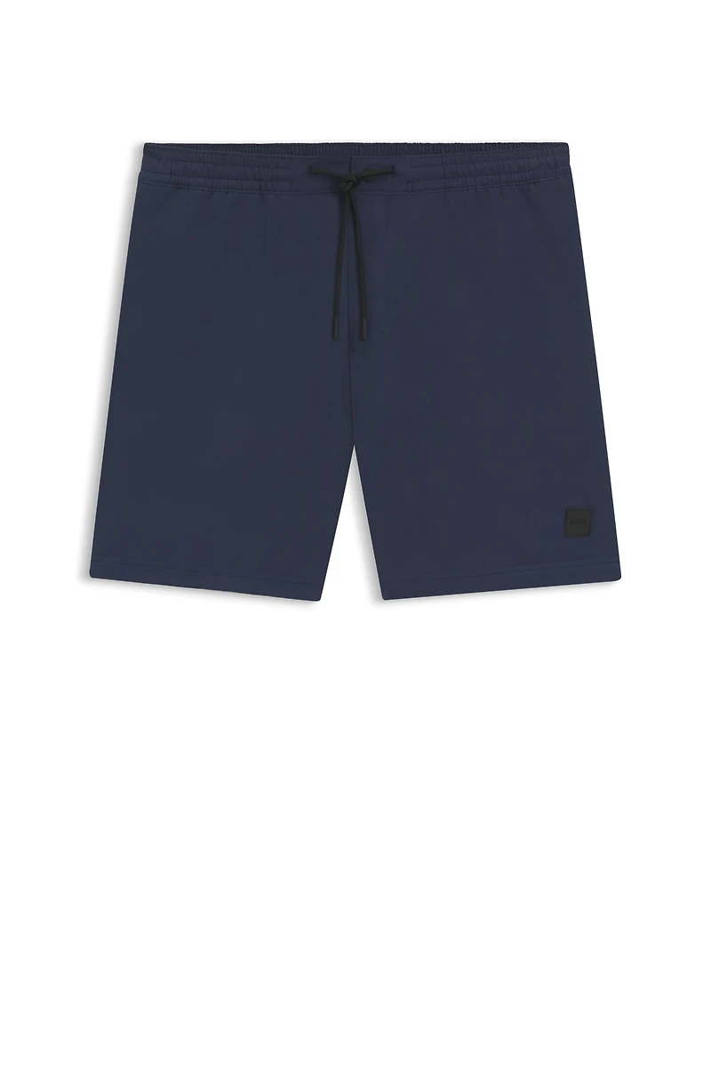 Packable swim shorts with logo badge