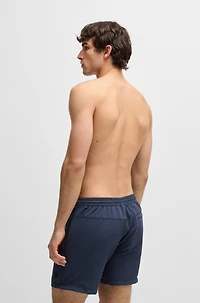 Packable swim shorts with logo badge