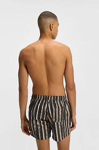 Printed swim shorts with logo detail