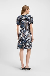 Satin dress with swirl print