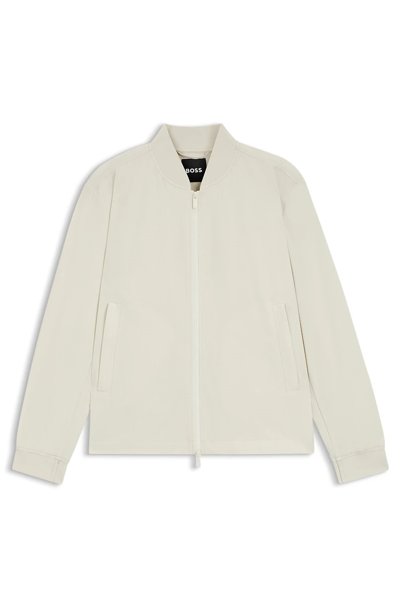 Water-repellent packable jacket with two-way zip