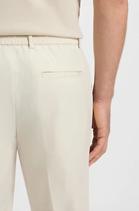 Packable trousers water-repellent stretch fabric
