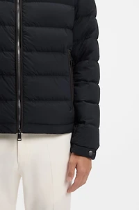Down-filled jacket with water-repellent finish