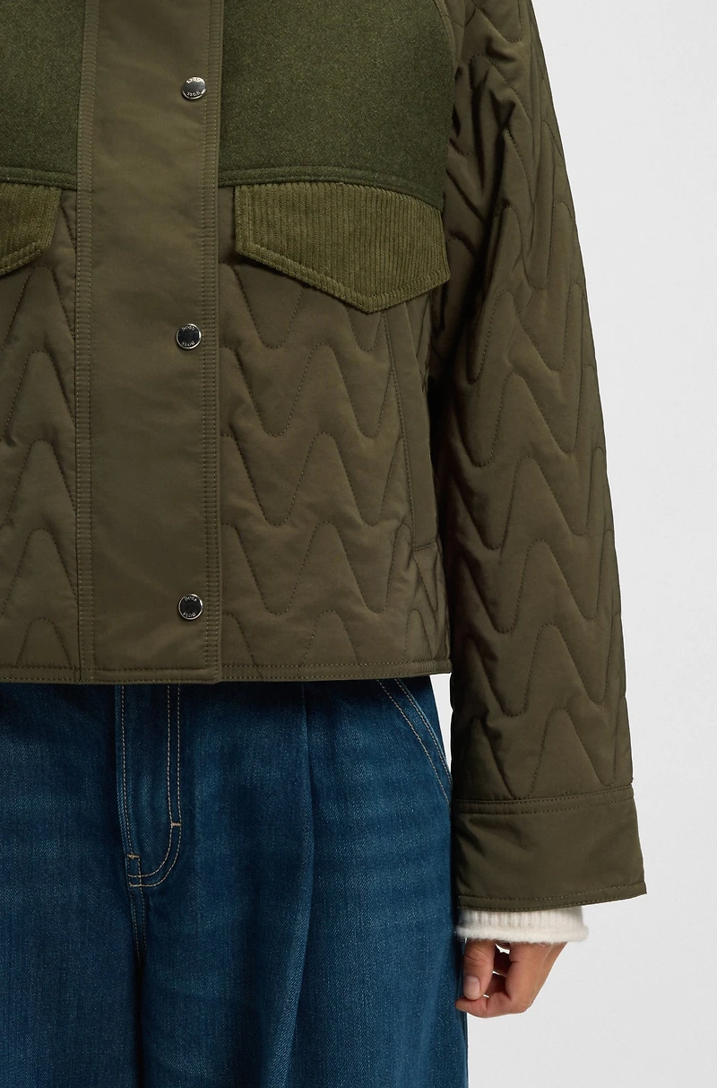 Mixed-material jacket with water-repellent finish