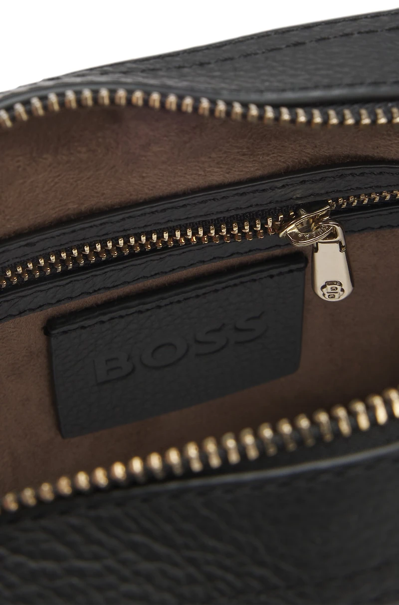 Crossbody bag in grained leather with logo lettering