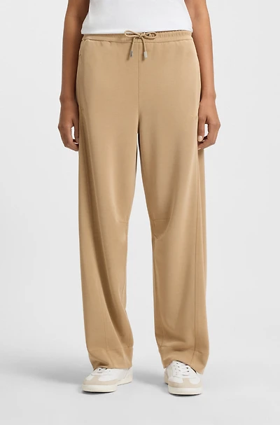 Embroidered-logo tracksuit bottoms with balloon shape