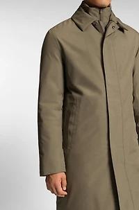 Water-repellent coat with detachable bib