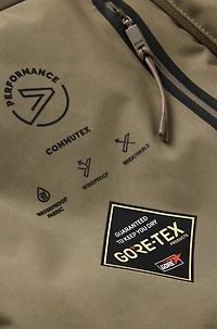 Water-repellent coat with detachable bib