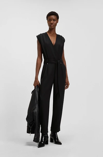 Wrap-front jumpsuit with hardware snaps