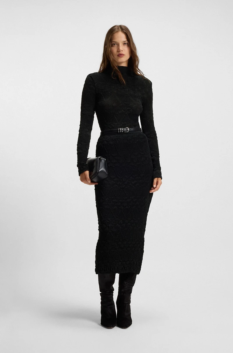 Geometric-plissé top with long sleeves