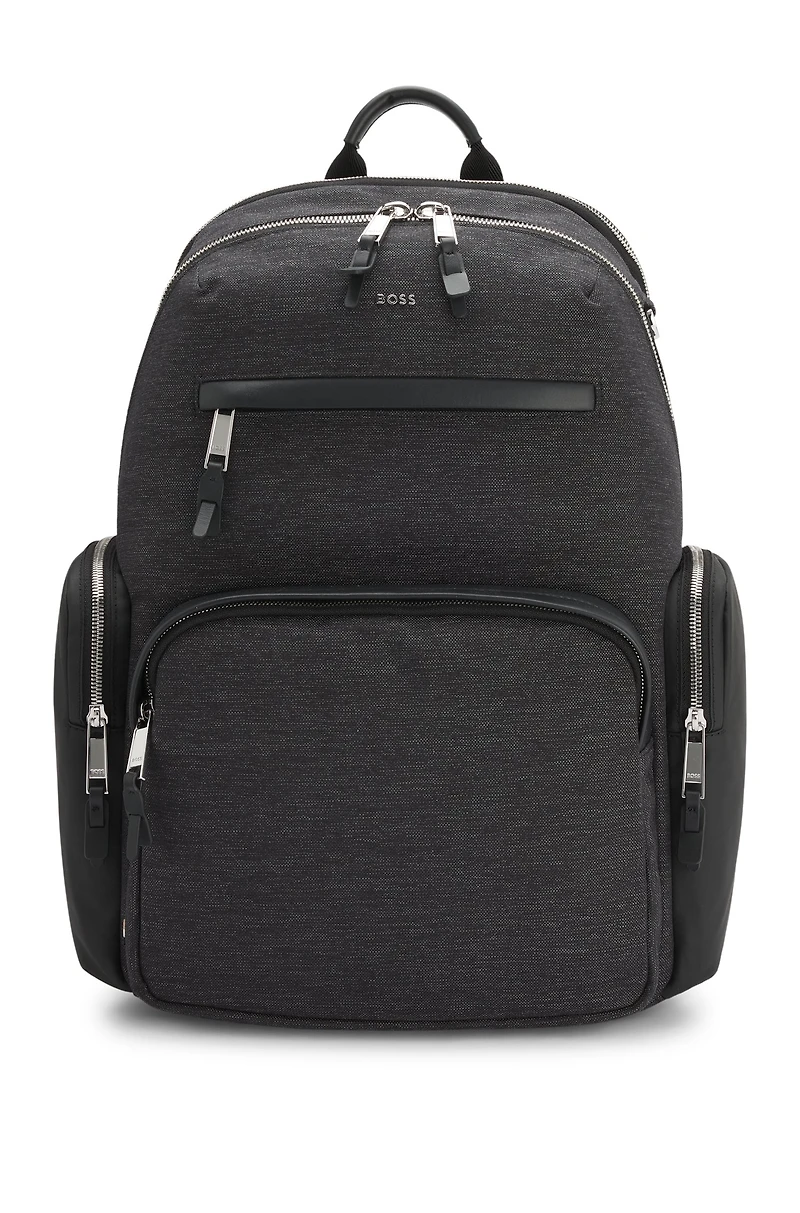 Backpack with contrast side pockets