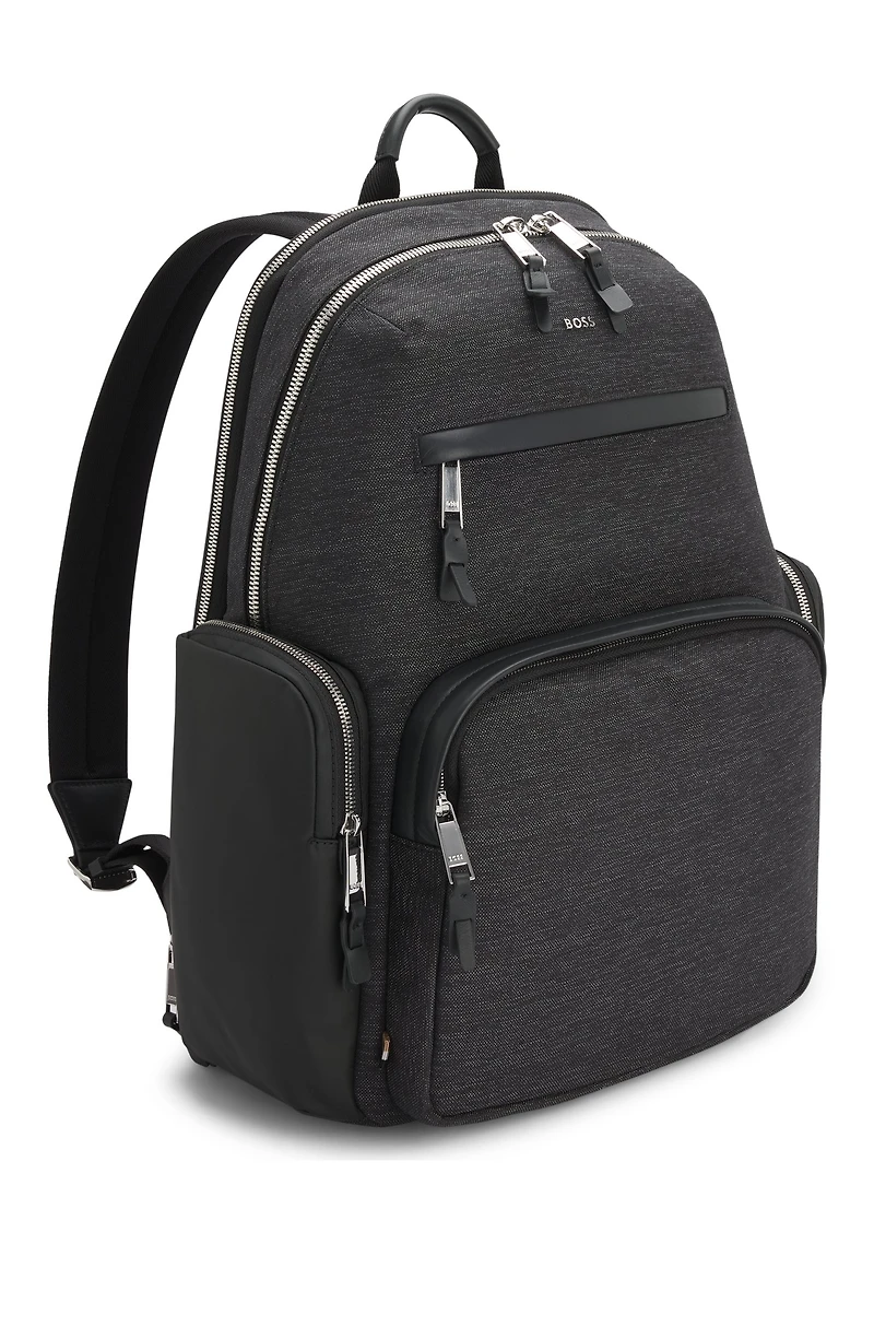 Backpack with contrast side pockets
