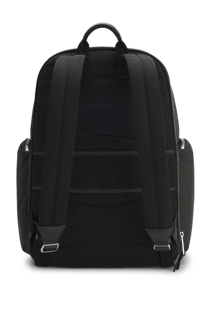 Backpack with contrast side pockets