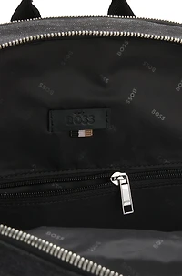 Backpack with contrast side pockets
