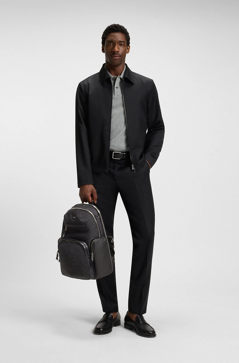 Backpack with contrast side pockets