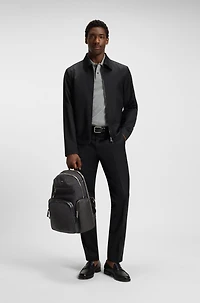 Backpack with contrast side pockets
