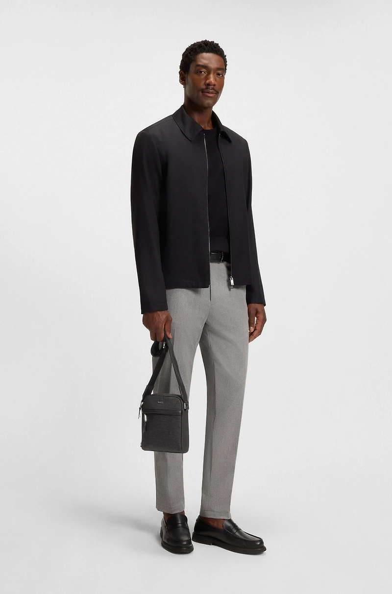 Reporter bag with leather trims