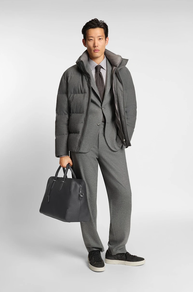 Embossed-logo holdall in grained leather