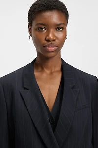 Relaxed-fit pinstripe blazer with concealed closure