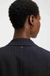 Relaxed-fit pinstripe blazer with concealed closure