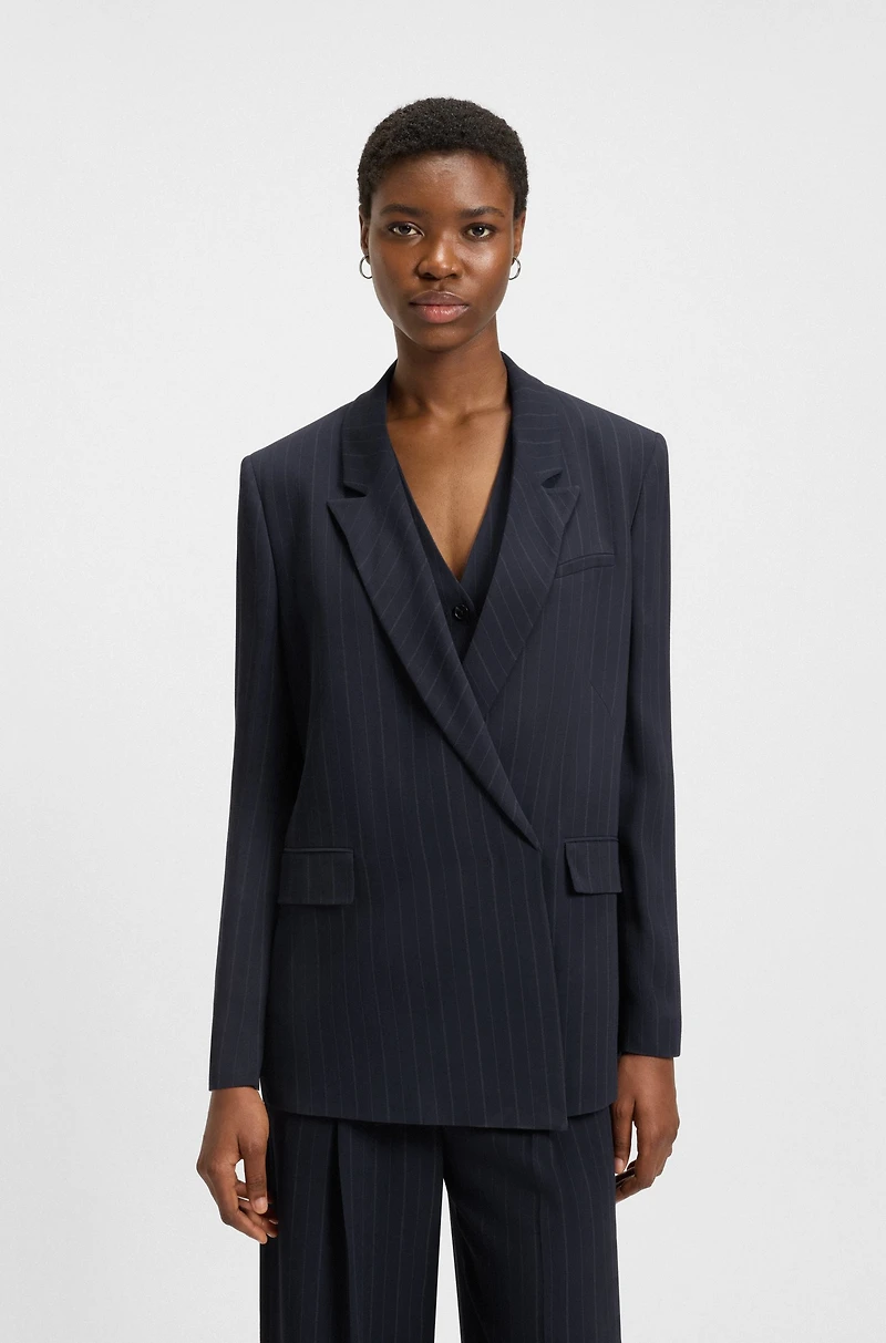 Relaxed-fit pinstripe blazer with concealed closure