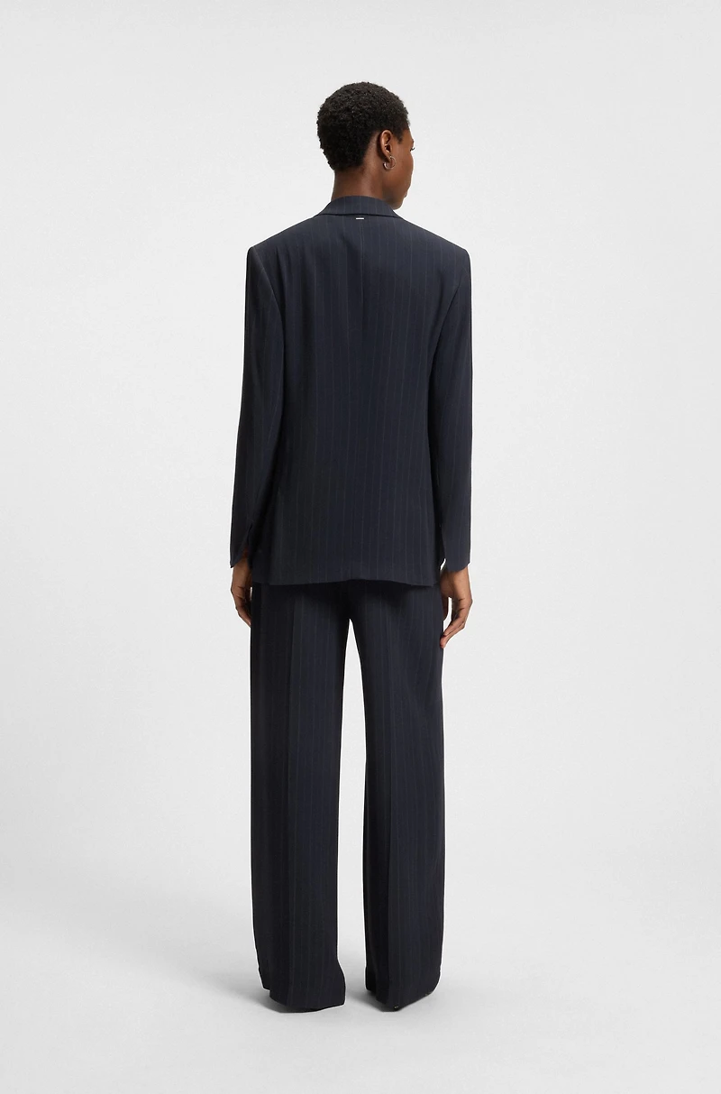 Relaxed-fit pinstripe blazer with concealed closure