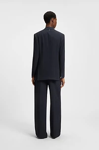 Relaxed-fit pinstripe blazer with concealed closure