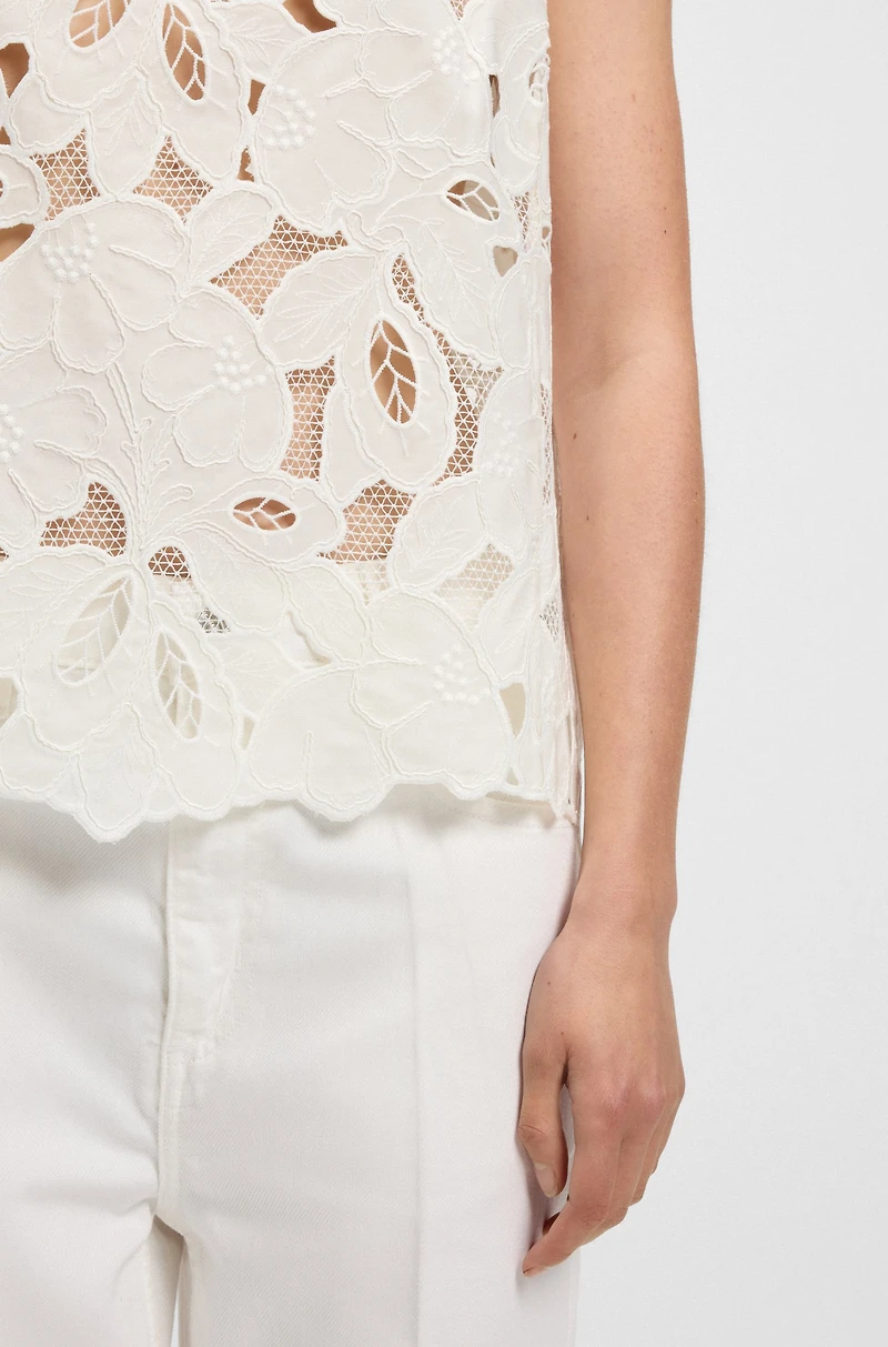 Sleeveless blouse with broderie anglaise