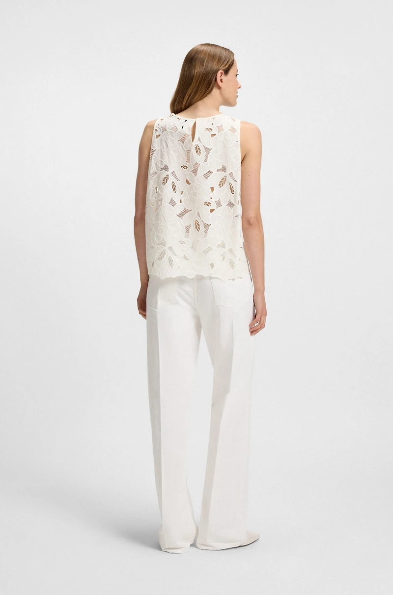 Sleeveless blouse with broderie anglaise