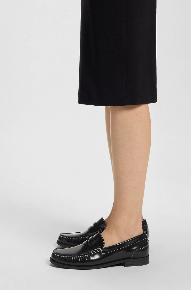 Leather moccasins with penny trim