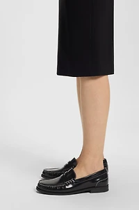 Leather moccasins with penny trim