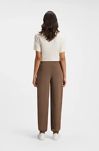 Lustrous-piping tracksuit bottoms a relaxed fit