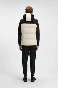 Down-filled gilet with water-repellent finish