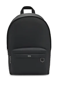 Backpack with smooth and structured finishes