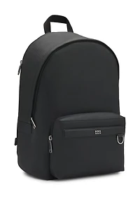Backpack with smooth and structured finishes