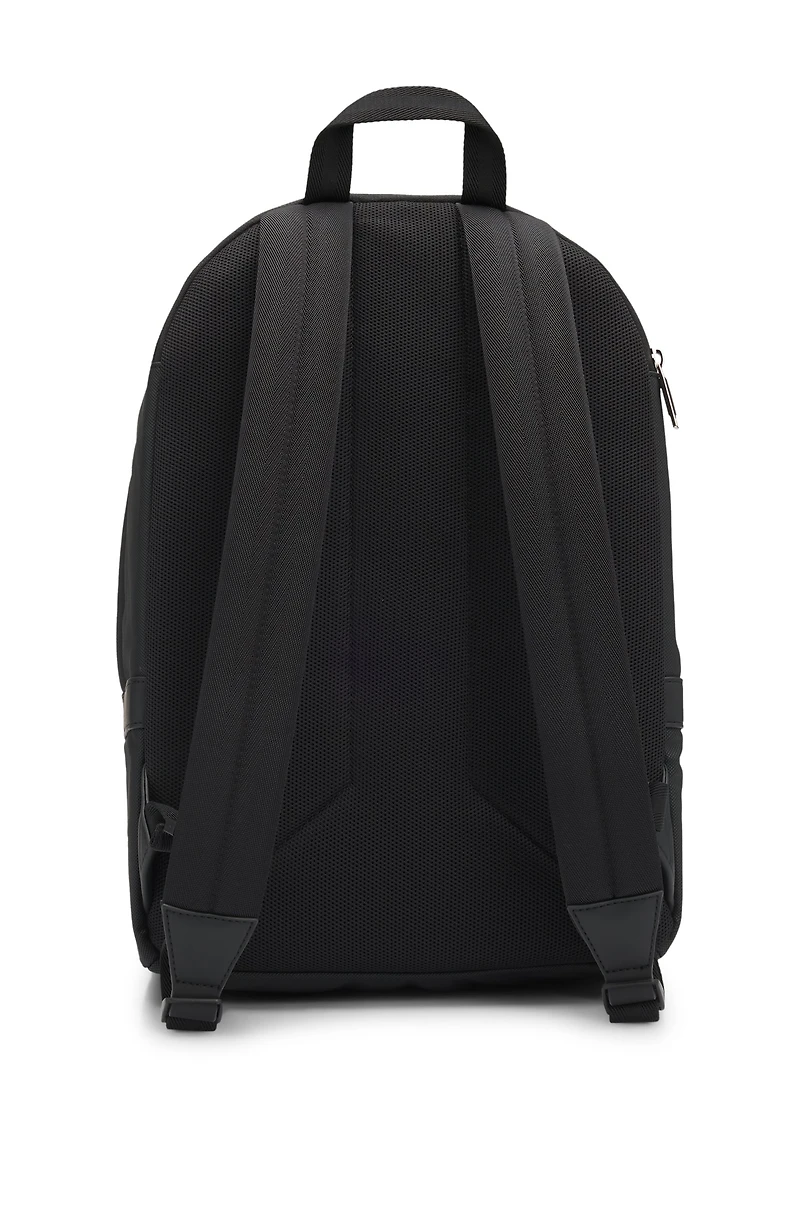 Backpack with smooth and structured finishes