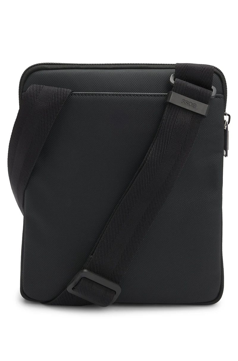 Reporter bag with smooth and structured finishes