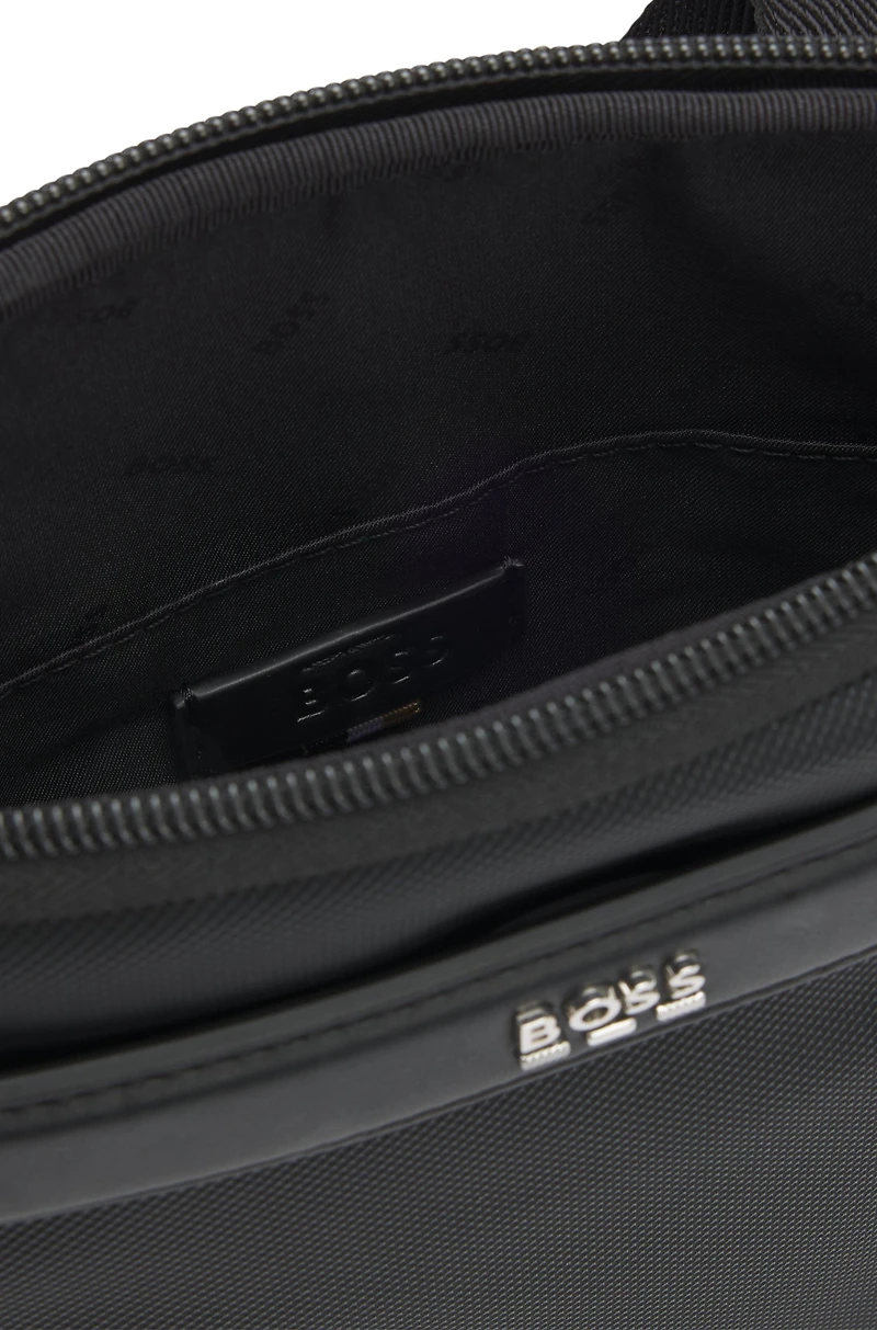 Reporter bag with smooth and structured finishes