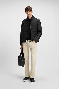 Reporter bag with smooth and structured finishes