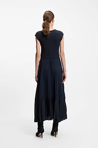 Knitted dress with plissé skirt part