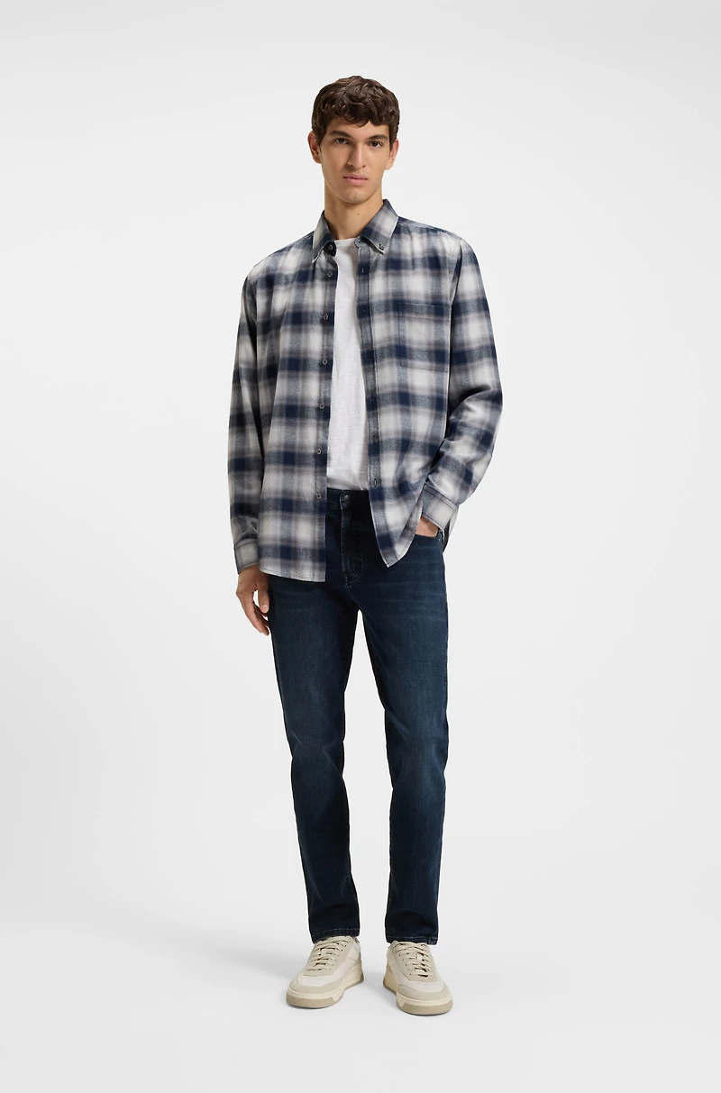 Blue tapered-fit jeans soft-motion denim