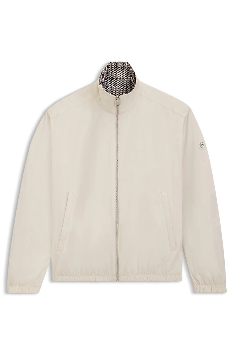 Water-repellent reversible jacket with check pattern