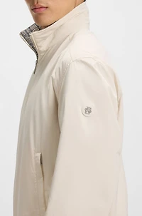 Water-repellent reversible jacket with check pattern